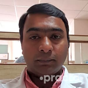 Dr. Dinesh