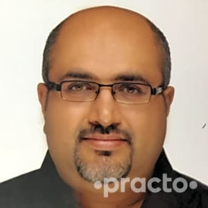 Dr. Manesh Chacko Philip